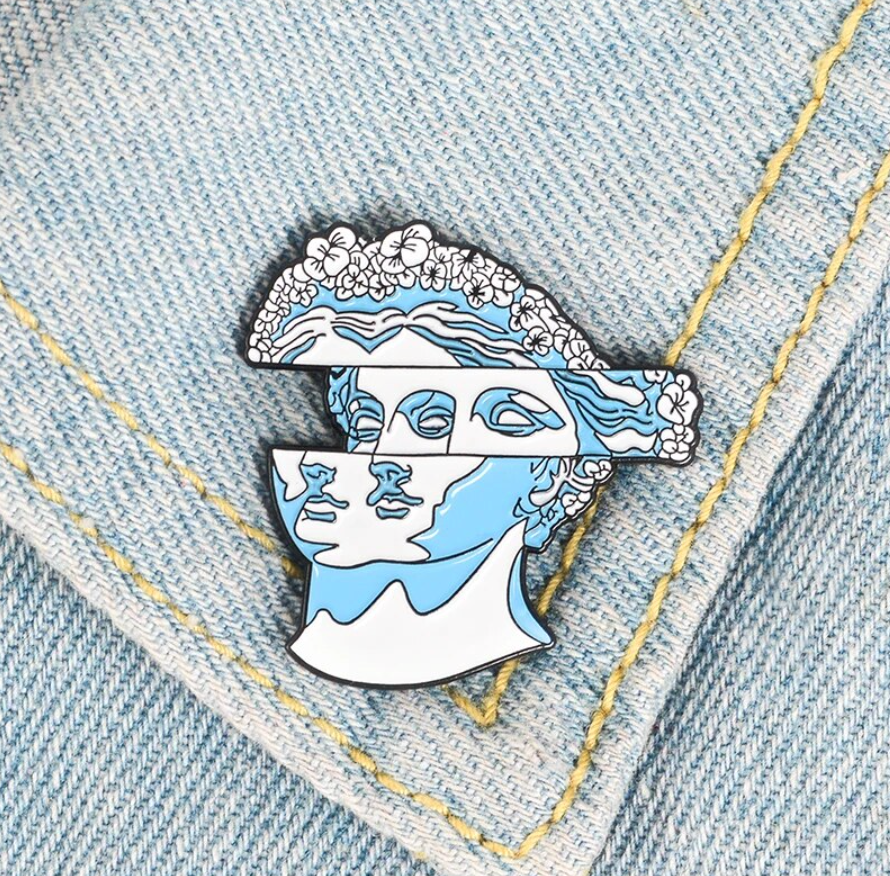 "Statue Face" Pin